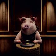 Visuel d'un porc souriant qui mange à une table